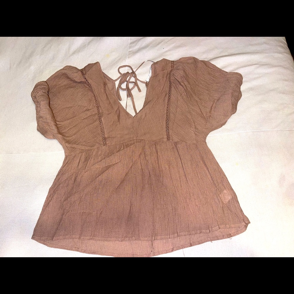 Baby doll top. Mauve color. Size:small. Never worn